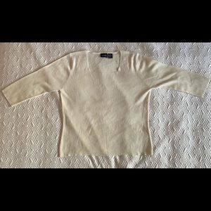 Creme sweater blouse.